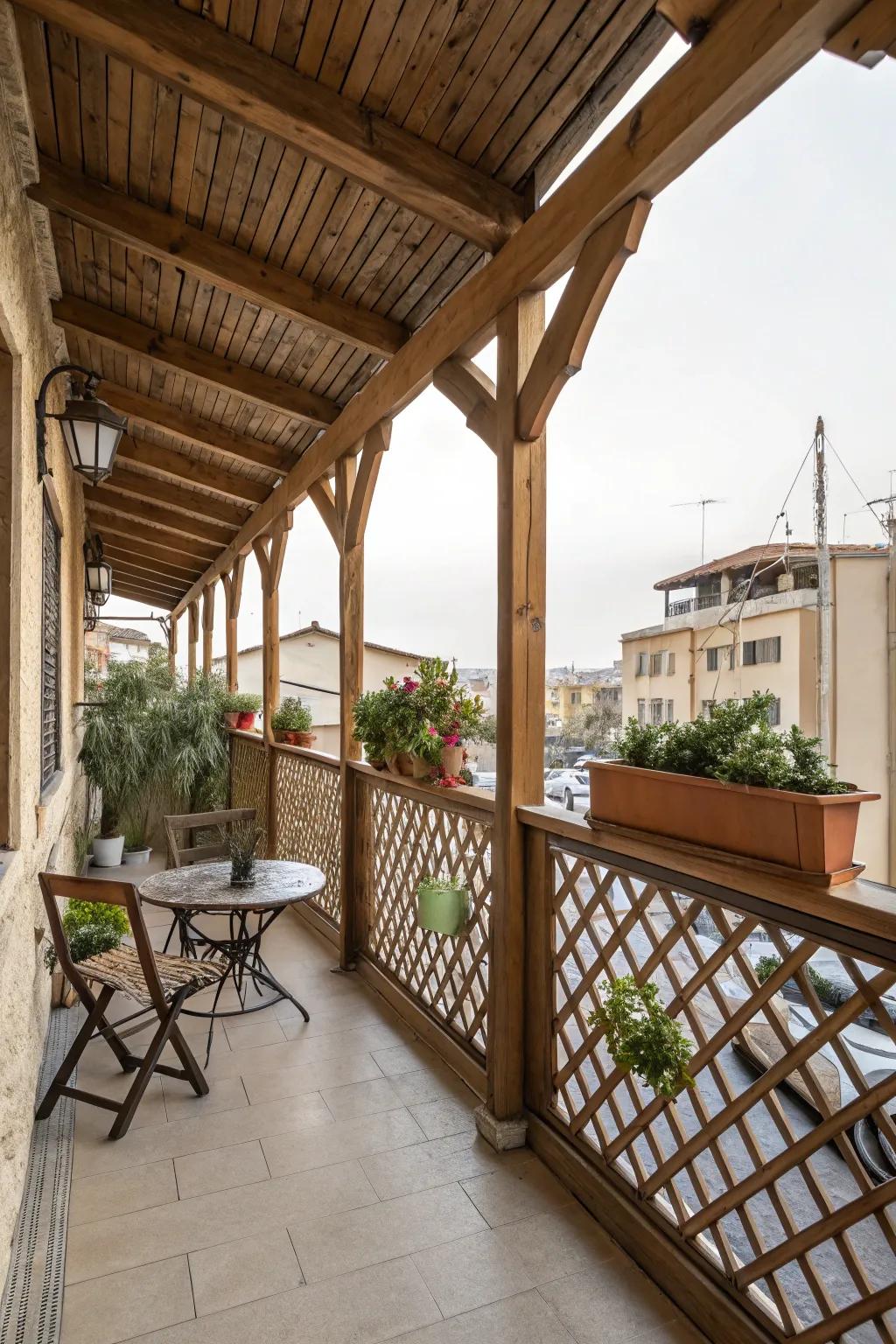 A cozy balcony shaded by a rustic timber frame.