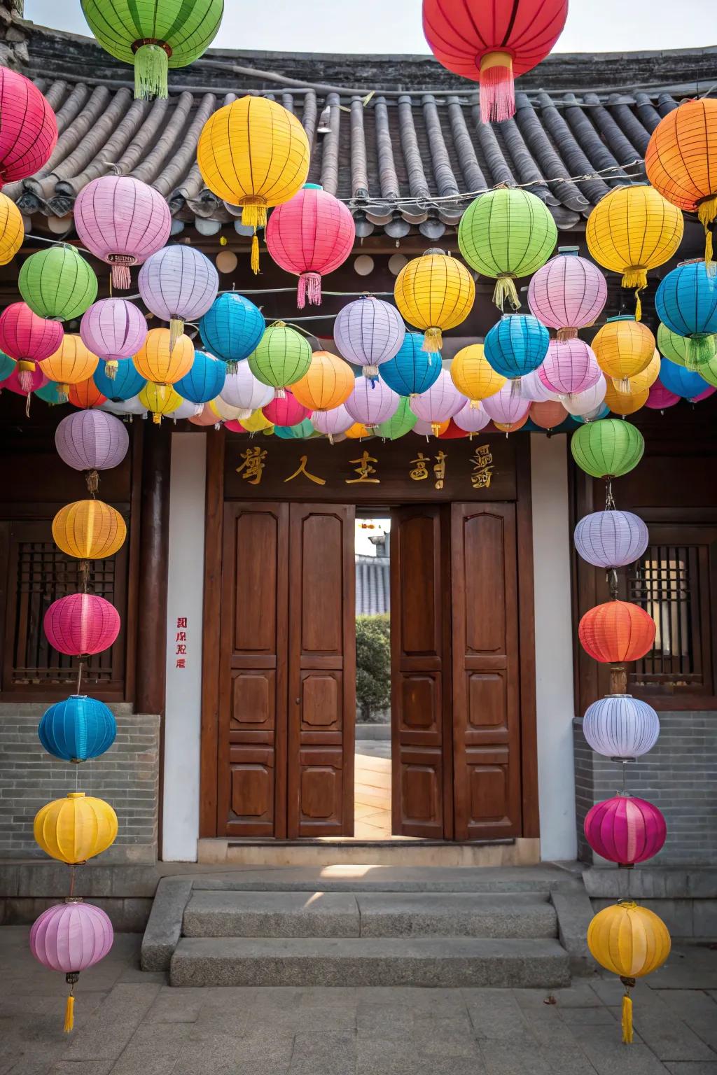 Paper lanterns bring vibrant color and light to any door.