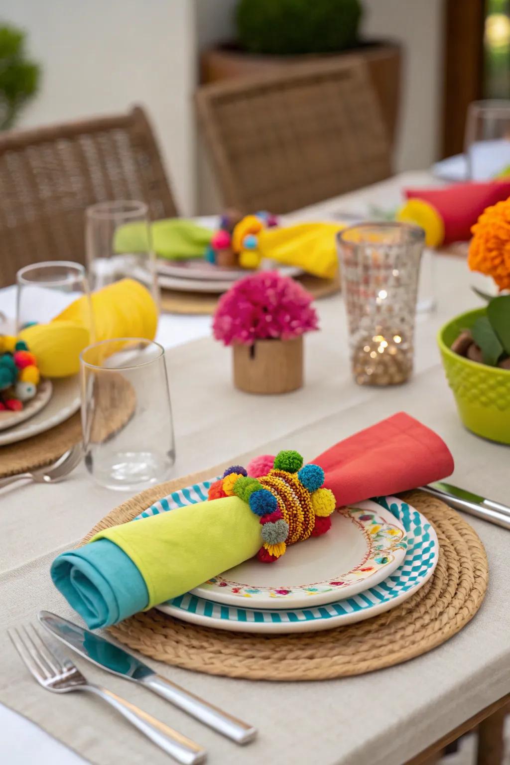 The table is given a burst of color by vibrant napkin rings.