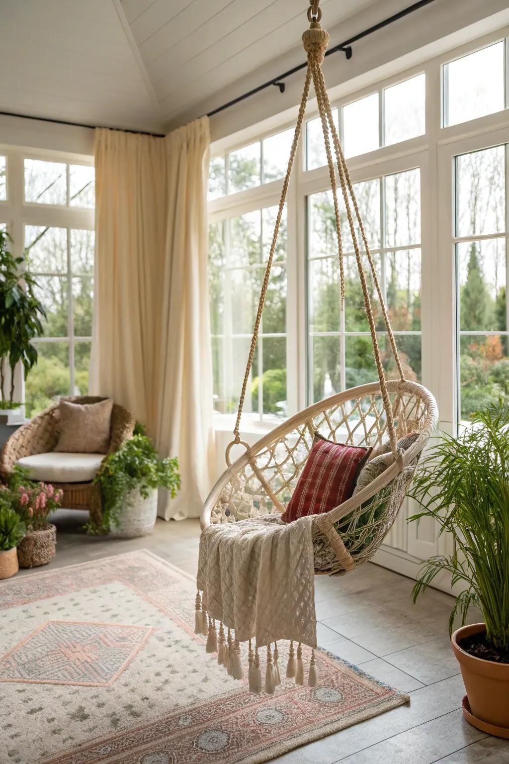 A hanging seat adds a hint of whimsy to the sunroom.