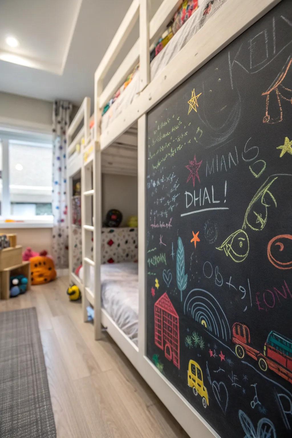 A creative chalkboard wall beneath the bunk bed.