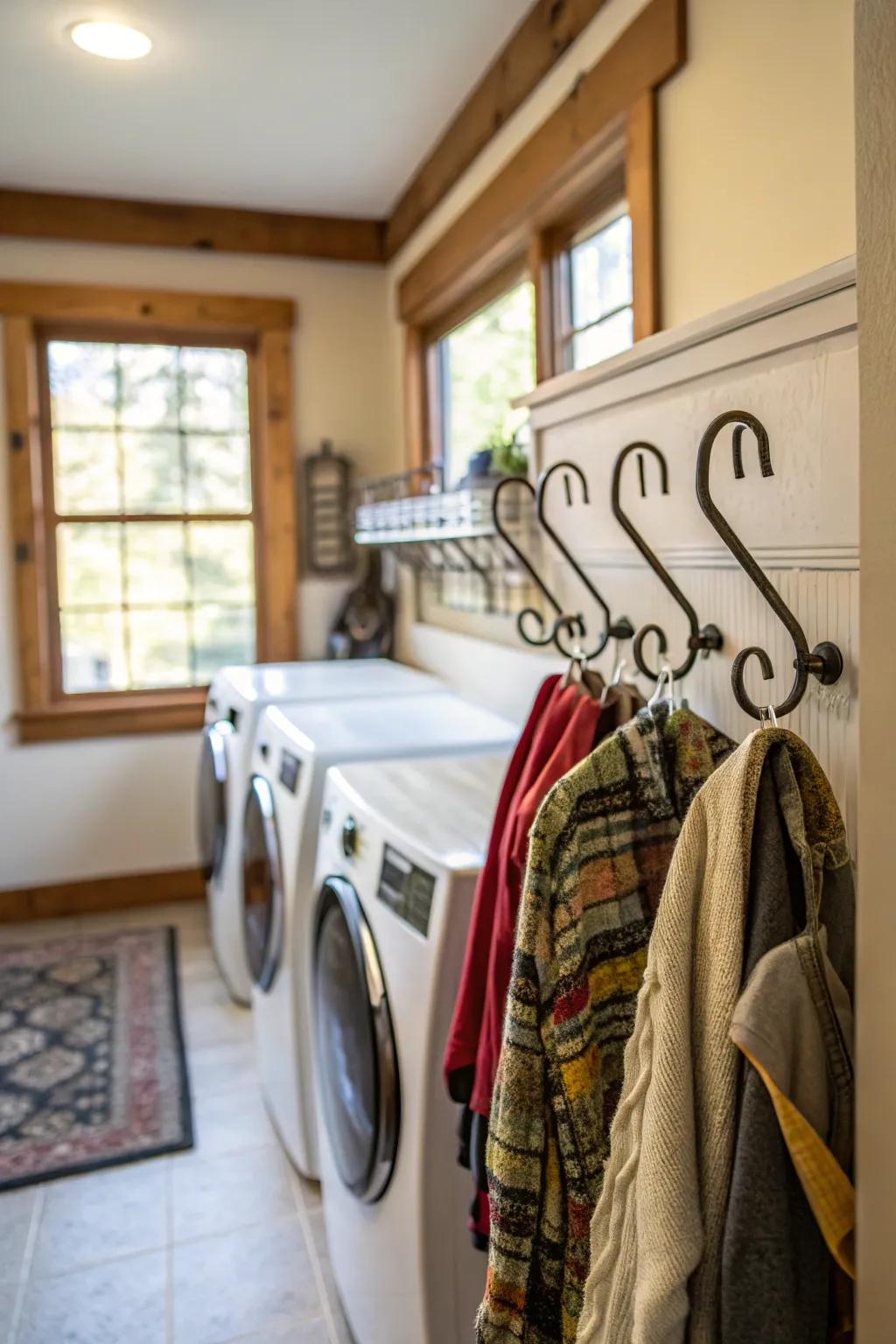 Pegs provide convenient hanging storage in this laundry room.