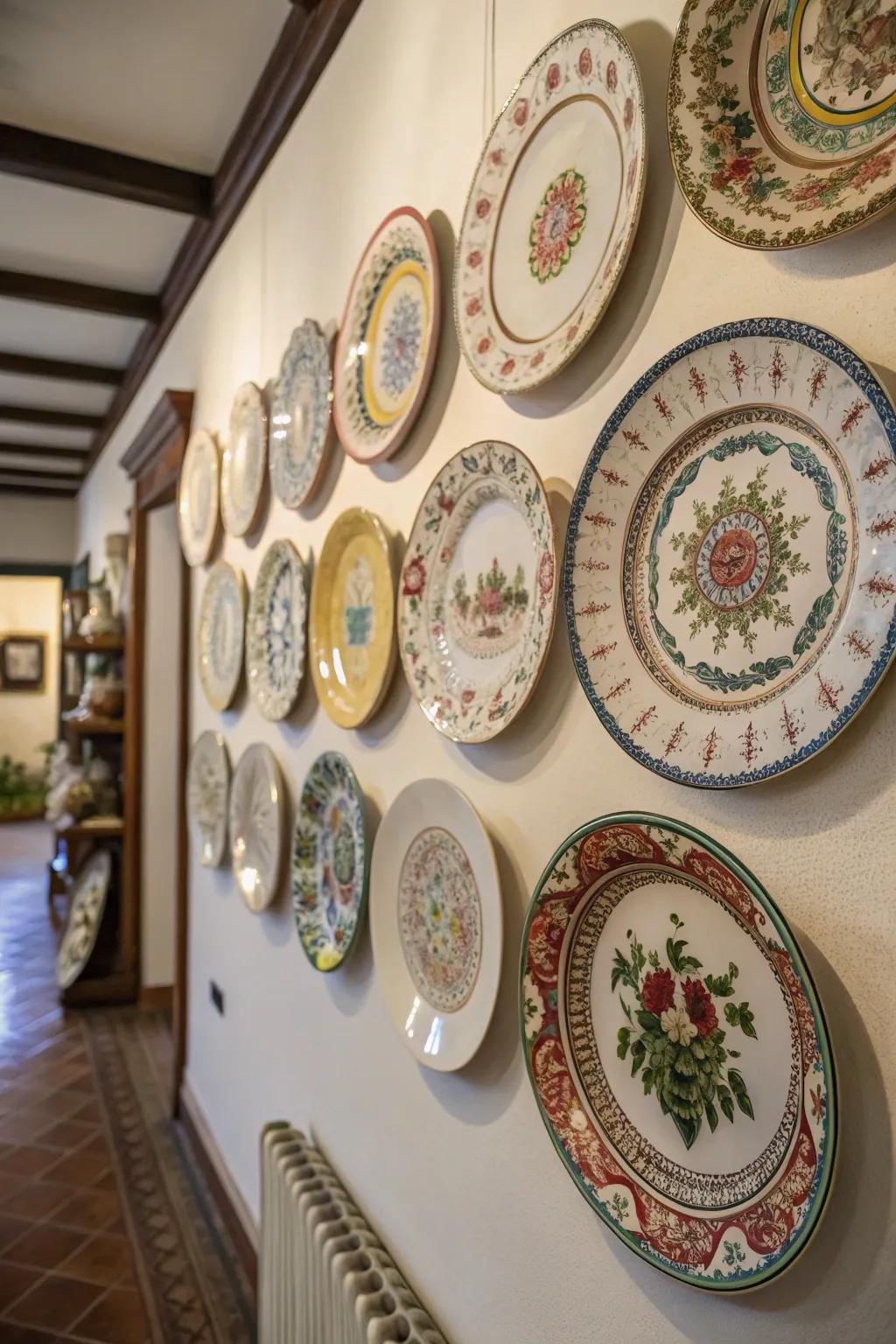 An eclectic compilation of antique plates composes a charming wall display.