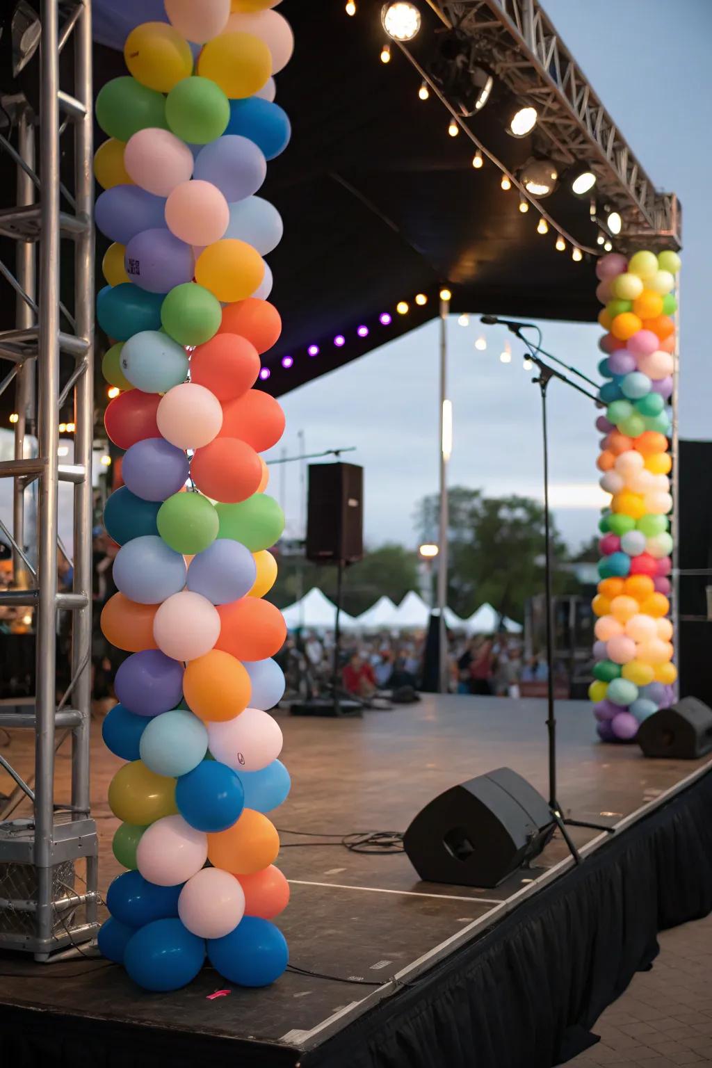 Balloon uprights framing the performance expanse on stage.
