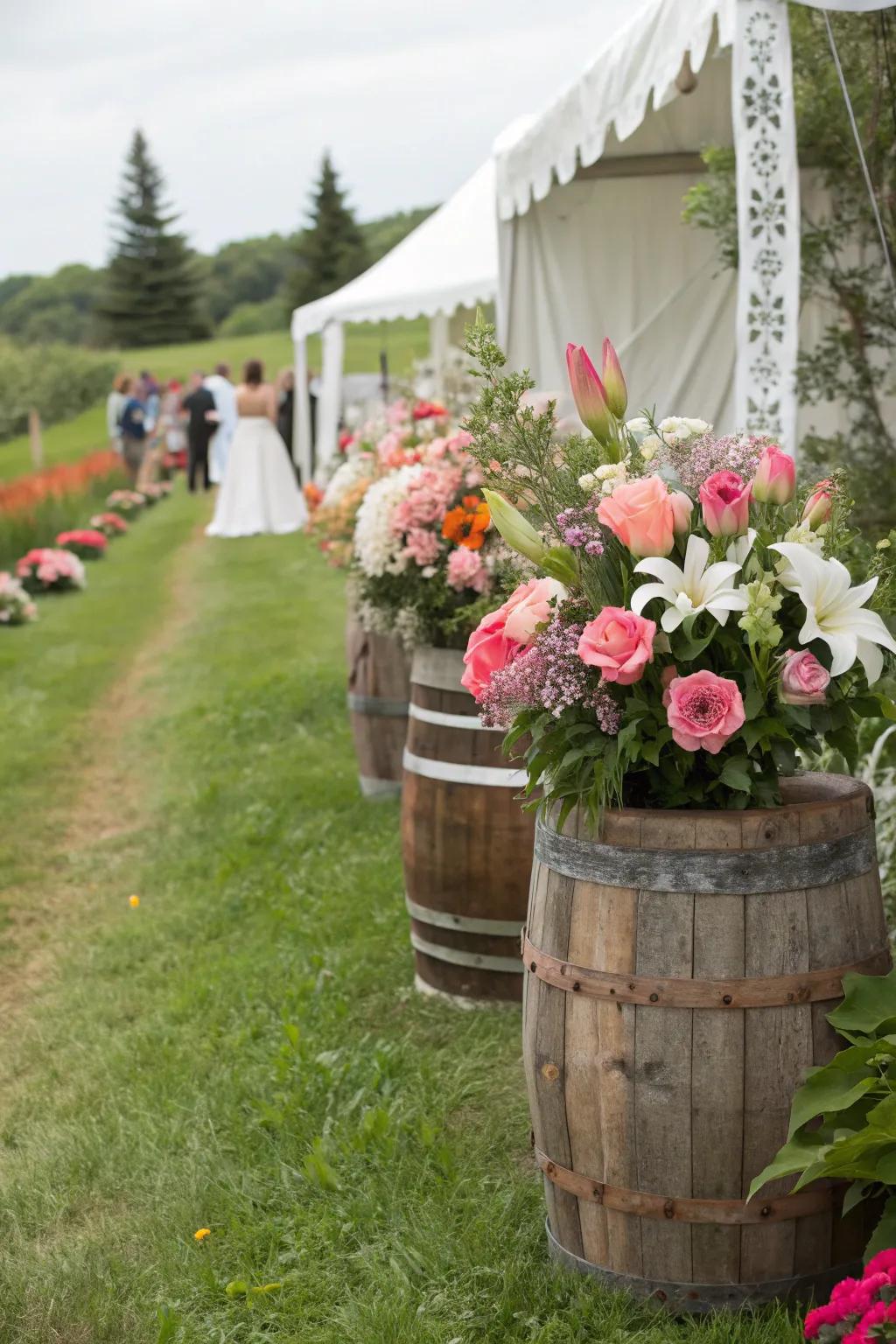 Country-style planters filled with floral arrangements, adding charm and warmth to a countryside wedding setting.